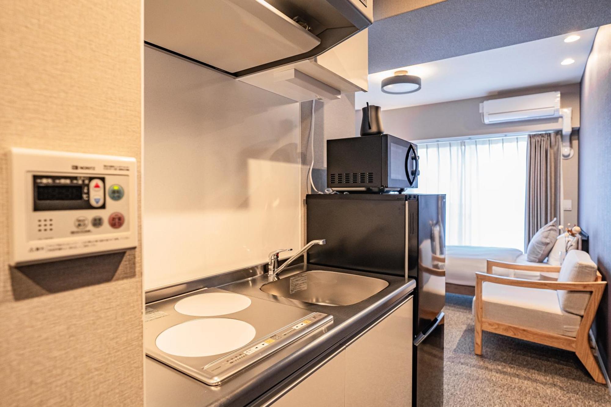 Apartment Hotel 11 Umeda Kamiyama أوساكا المظهر الخارجي الصورة