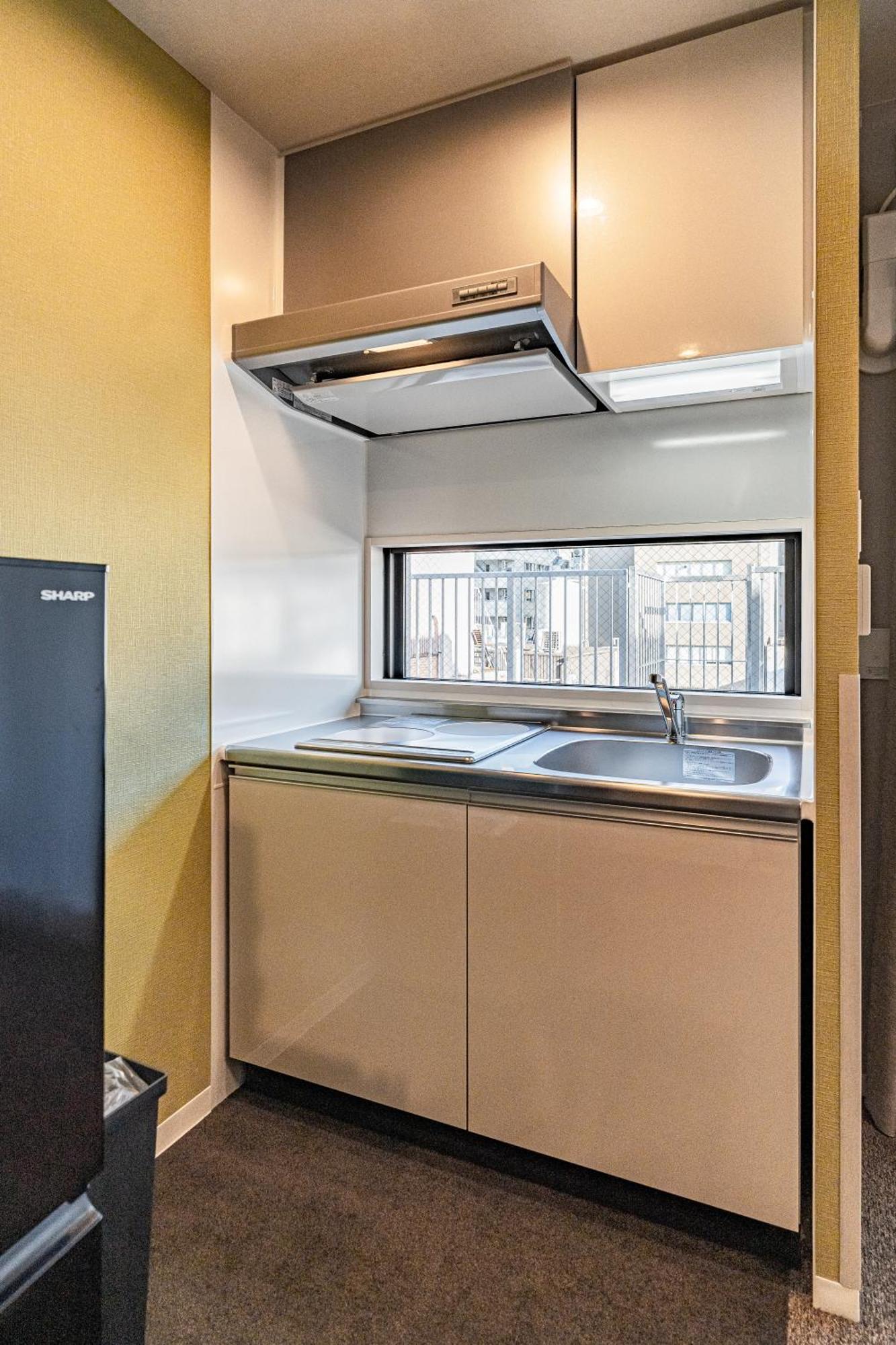 Apartment Hotel 11 Umeda Kamiyama أوساكا المظهر الخارجي الصورة